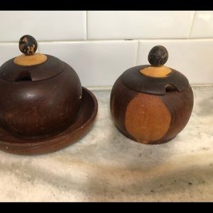 Two wooded bowls with lids